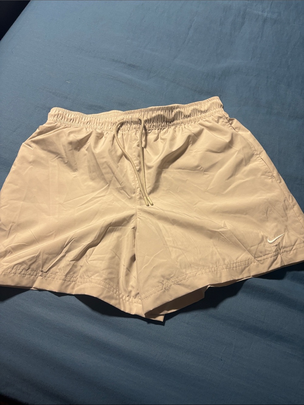 Nike tan shorts with pockets